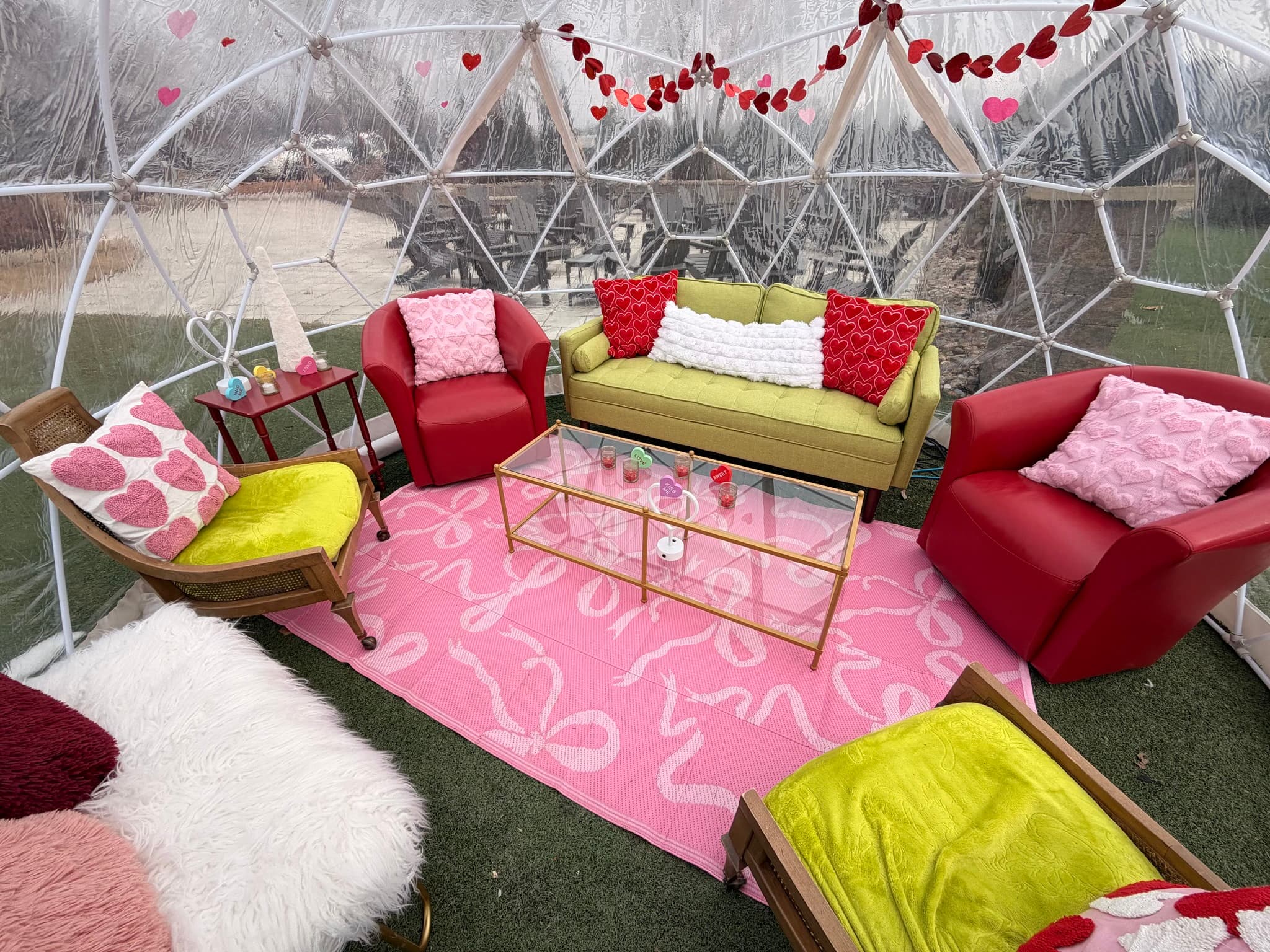 Valentine's Day styled lounge inside a heated igloo dome